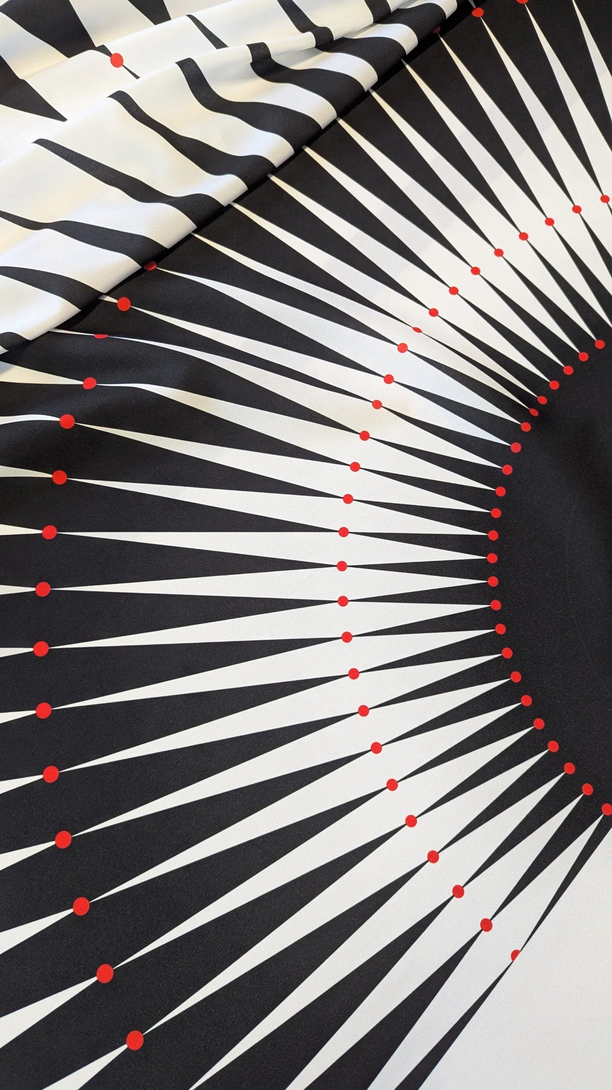 Black and white skirt print positioned across an individual fabric panel